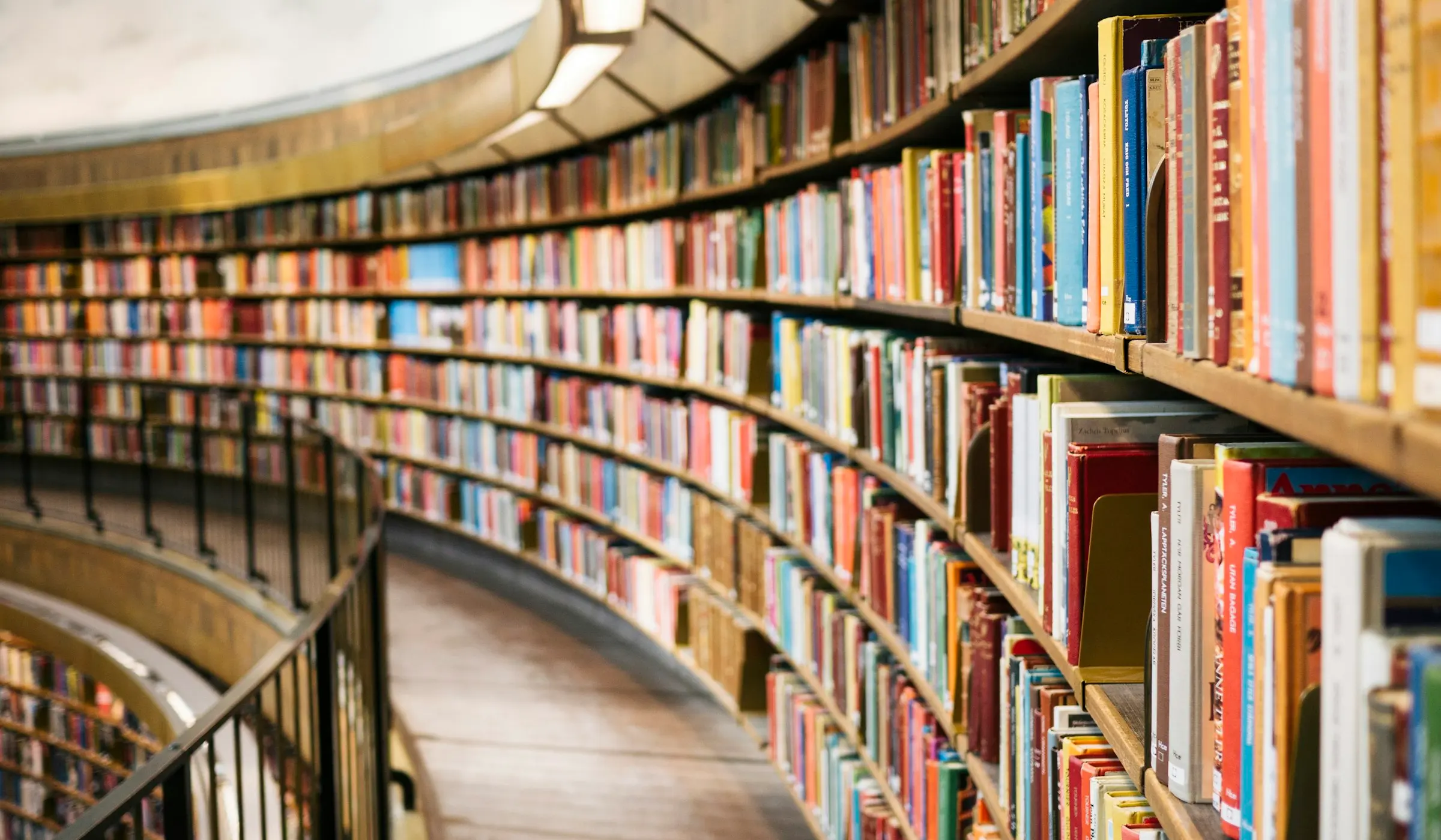 Open books on a wooden table ready for study